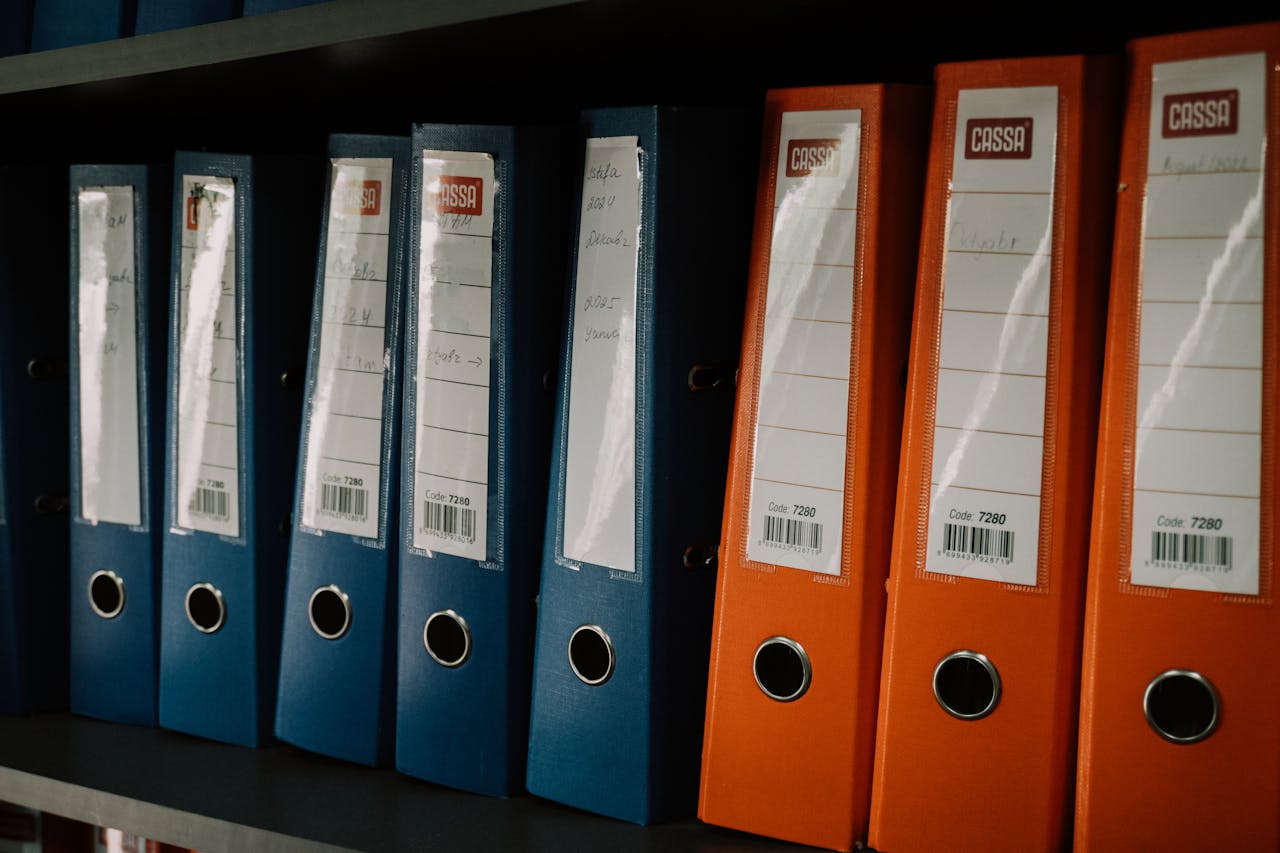 Colourful office binders on shelf